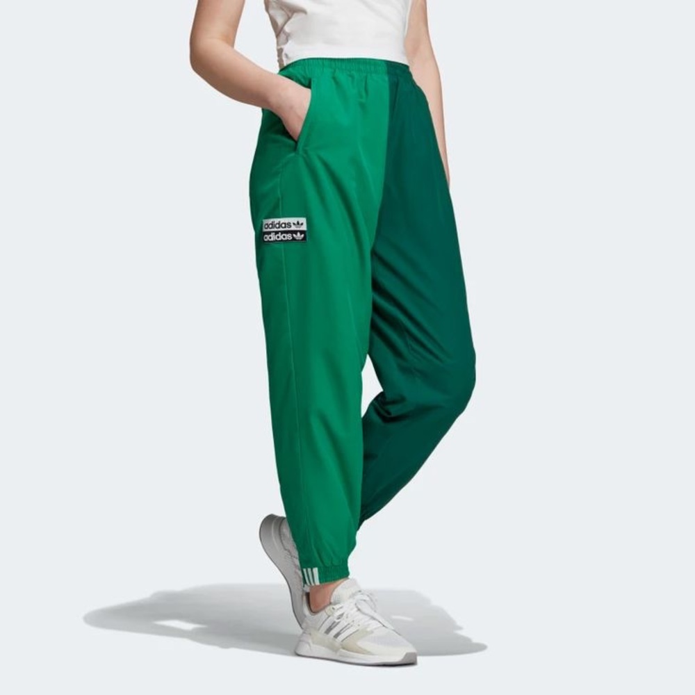 Two tone green adidas track pants